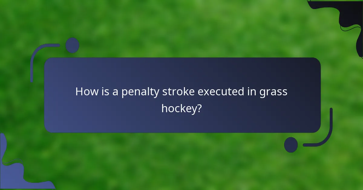 How is a penalty stroke executed in grass hockey?