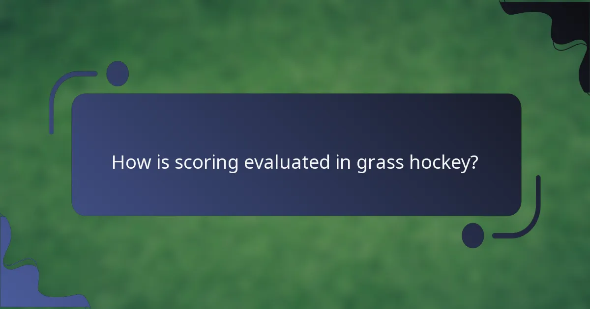 How is scoring evaluated in grass hockey?