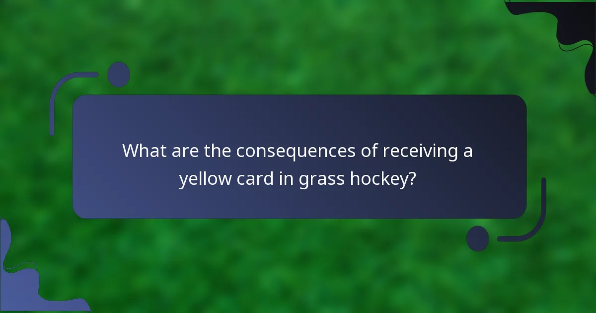 What are the consequences of receiving a yellow card in grass hockey?